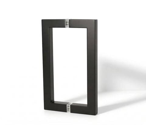 Black rectangular frame with metal hinges and open center panel casting a shadow on white background