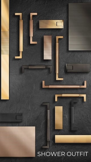 Collection of bathroom hardware fixtures including handles, knobs, and towel bars in gold and black finishes on dark gray background