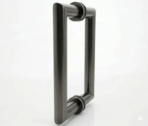 Brushed stainless steel rectangular door handle with curved grips on white background