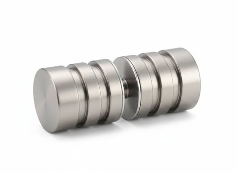 Cylindrical metal coupling connector with segmented threaded bands on white background