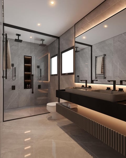Modern luxury bathroom with large walk-in shower, double vanity, mirrors, and warm ambient lighting in gray and black tones